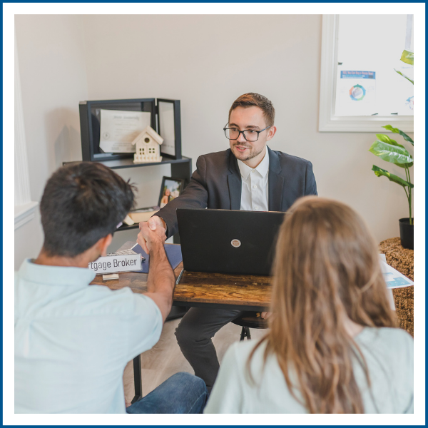 mortgage broker meeting with home buyers